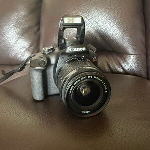 Canon Black EOS DSLR Camera with Zoom Lens